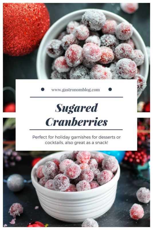 Sugared Cranberries in a white bowl, Christmas ornaments behind