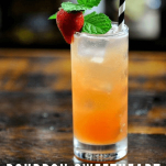 Pink highball cocktail, straw, mint