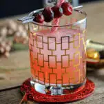 Pink cocktail in gold glass