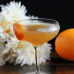 Orange cocktail in coupe