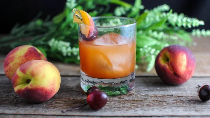 Fired Peach Old Fashioned Cocktail - bourbon, peaches, hot sauce