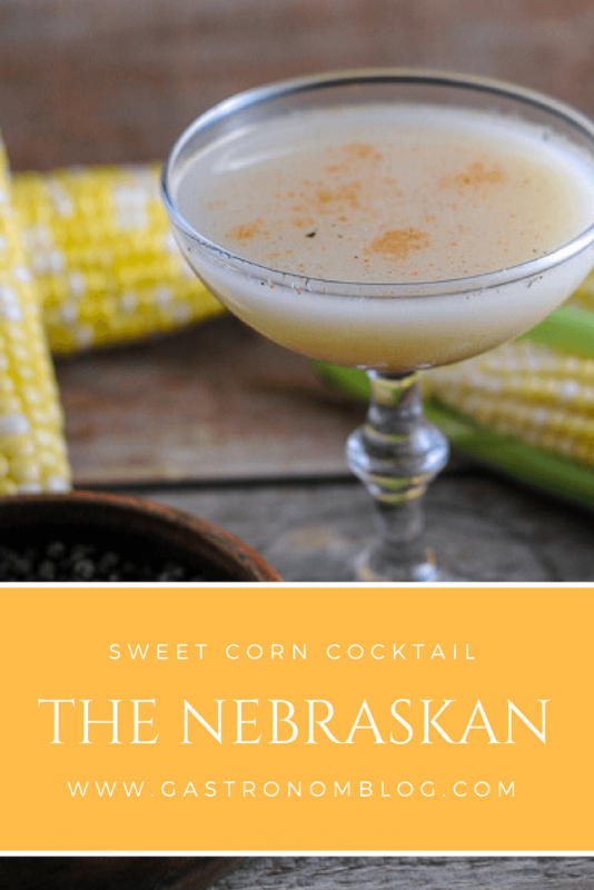 The Nebraskan Cocktail - yellow cocktail in coupe, corn in background