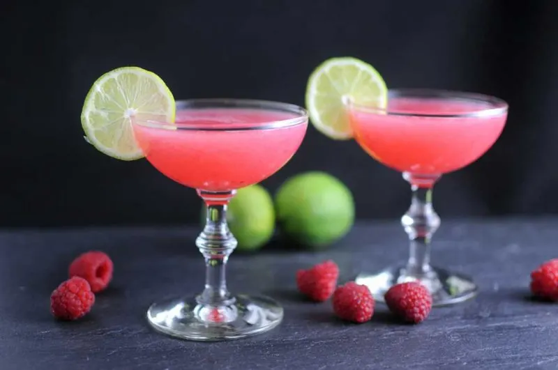Raspberry Gimlet Cocktail - gin, lime juice, raspberries and simple syrup in a coupe