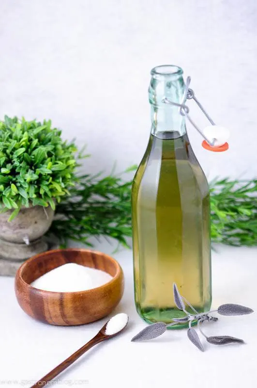 Sage Simple Syrup, sugar in a wooden bowl, wooden spoon