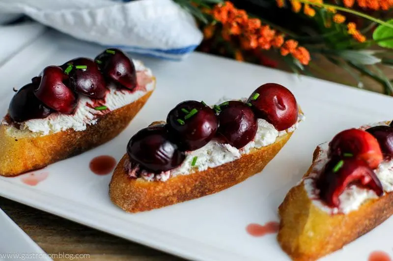 Cherry Goat Cheese Crostini on a white plate