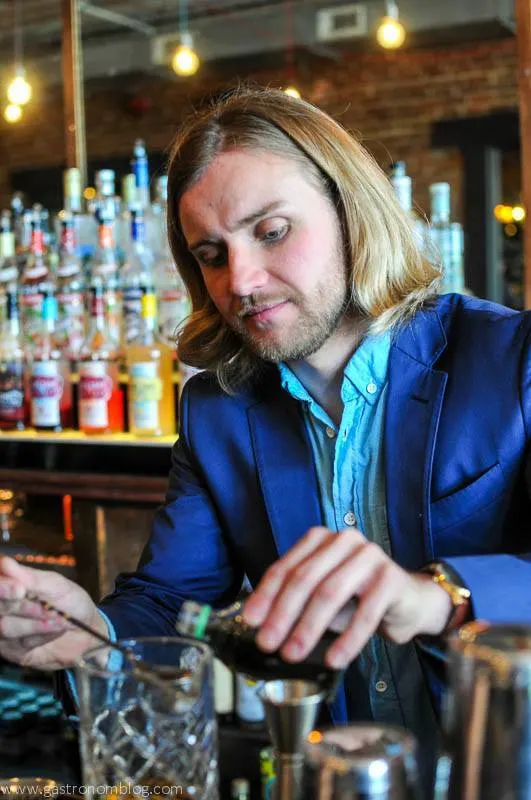 David Kerr, Owner of the Tavern Omaha mixes a drink.