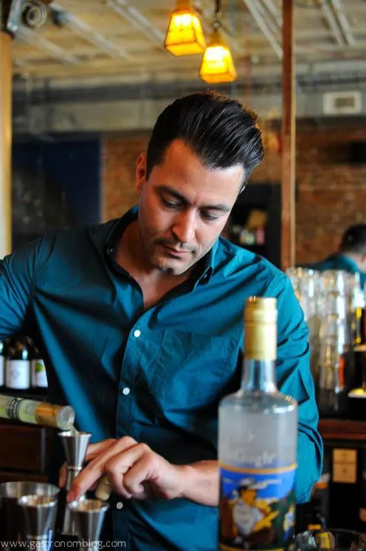 Brian, bar manager at The Tavern Omaha mixes up a cocktail