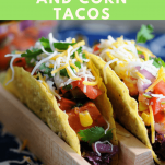 Sweet Potato, Corn and Black Bean Vegetarian Tacos in wooden holder on blue and white napkin