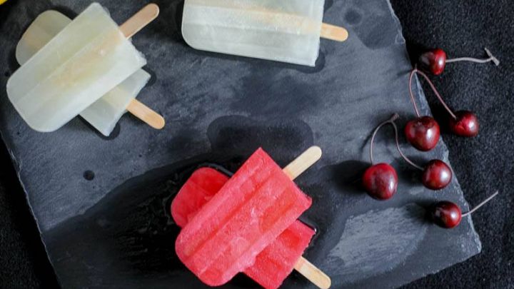 A pair of boozy popsicles, perfect for summer, Jasmine Lemonade Gin Pop and a Cherry Limeade Vodka Pop