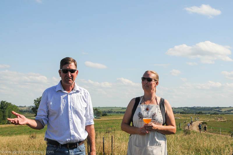 Krista and Doug Dittman, our hosts for the evening standing in the field
