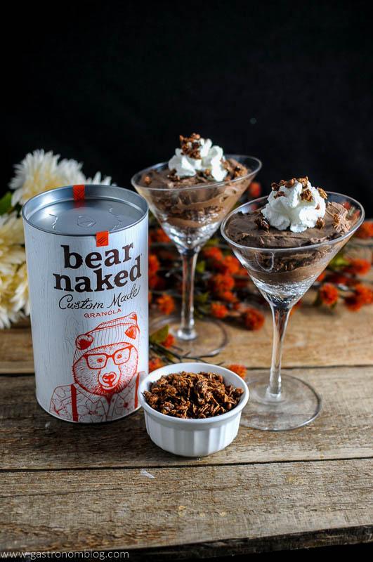 Double Chocolate Kalhua Parfait With Bear Naked Granola in martini glasses with whipped cream, canister of granola and some in a white ceramic bowl