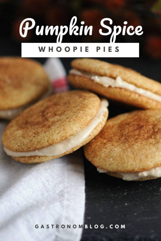 Snickerdoodle Pumpkin Spice Whoopie Pies with Amaretto Cream in pile on white napkin