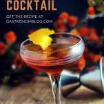 Ginger Snap Cocktail, brown cocktail in coupe with lemon peel, orange flowers and jigger