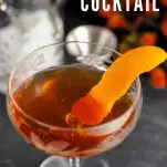 whiskey cocktail in coupe with orange peel
