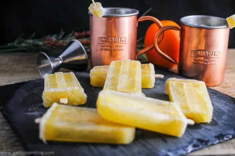 Sunrise Over Moscow Mule Ice Pops, Moscow Mule cups in background