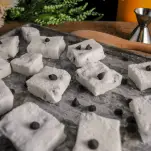 Chocolate chip marshmallows on a cookie sheet