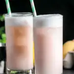 Pink highball cocktail with white foam