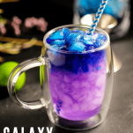 Purple and blue Moscow Mule in a clear mug