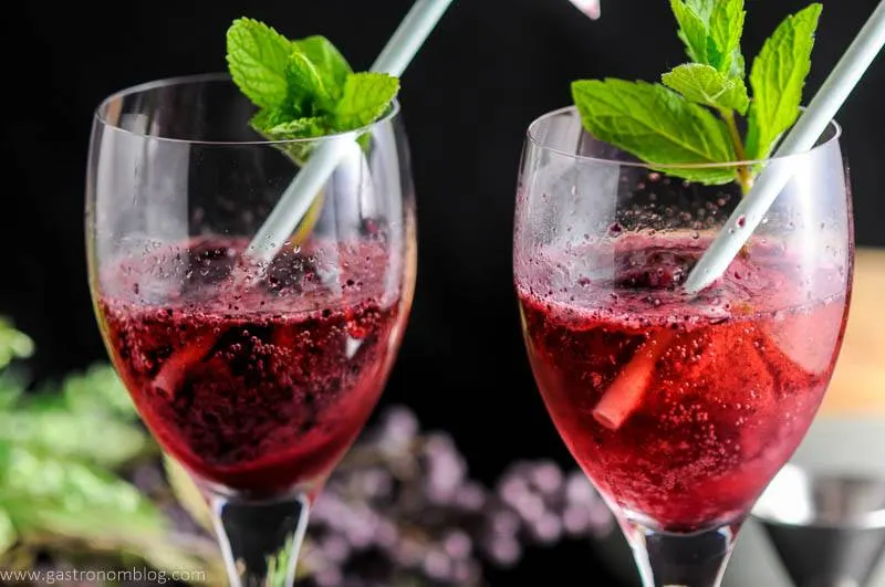 Blueberry Mint Sorbet Rose Float in wine glasses with mint and straws