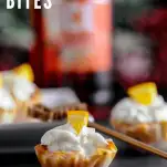 Dessert bites with whipped cream and orange slices