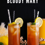 Bloody Mary cocktails in highballs with citrus and straws