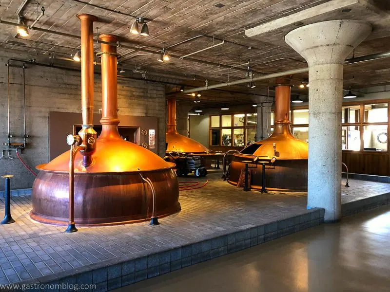 Big copper pot stills sit in the main distilling room of Anchor Distilling