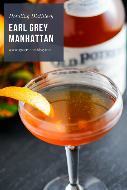 Earl Grey Manhattan with Hotaling Distilling, brown cocktail in coupe with orange peel. Whiskey bottle behind
