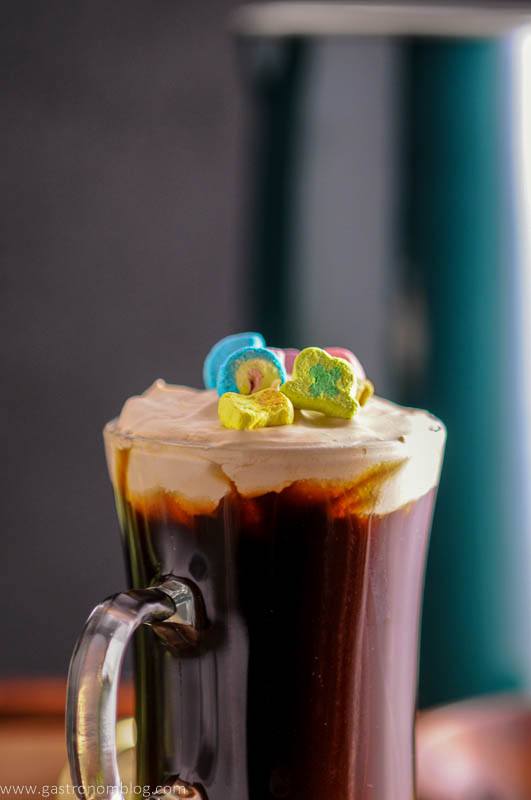 A mug of Toasted Cream Irish Coffee garnished with Lucky Charm's Marshmallow