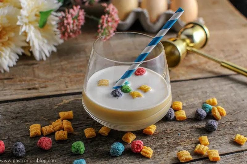 Cereal Milk cocktail with straw and cereal