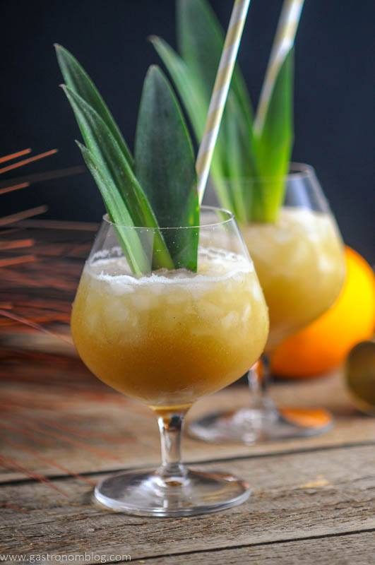 Coconut Rum Painkillers are a great rum, orange juice and pineapple Tiki Cocktail that is perfect for beating the heat!