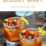 Bloody Marys in glasses with pitcher behind