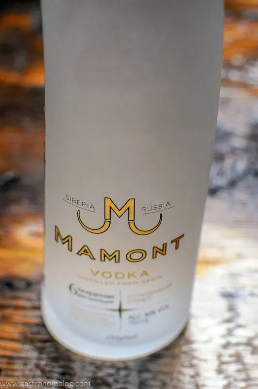 Detailed shot of the Mamont Vodka logo displayed on Mamont Vodka's distinictive Mammoth Tusk inspired bottle.
