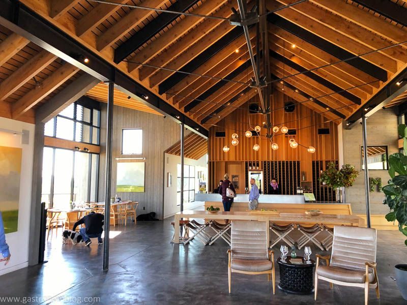 The beautiful high ceilings of the MacRostie Vineyards tasting room create a comfortable spot to taste wine and see the beautiful views.