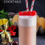 Pink cocktail in tall glass with white foam