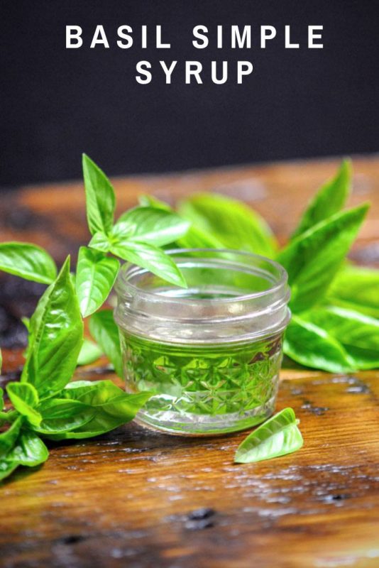 Syrup in jar, basil in background