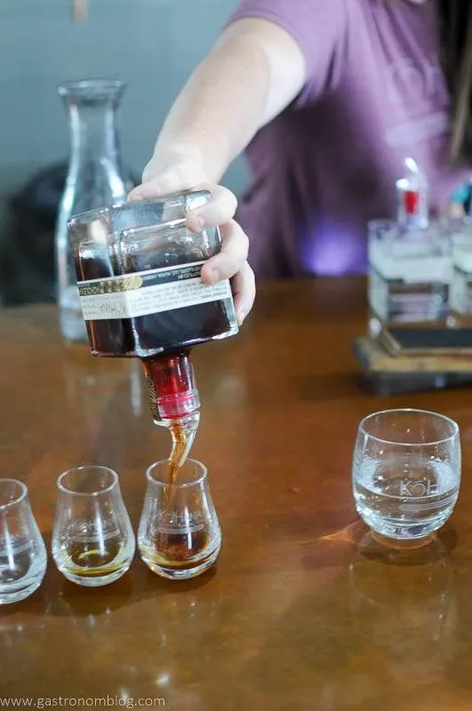 Chocolate rum being poured in tasting glass