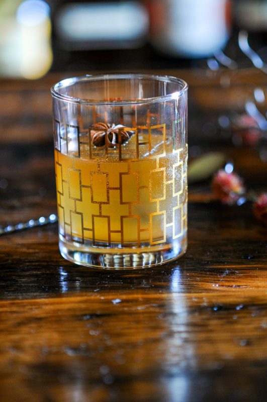 Brown butter bourbon cocktail in gold rocks glass