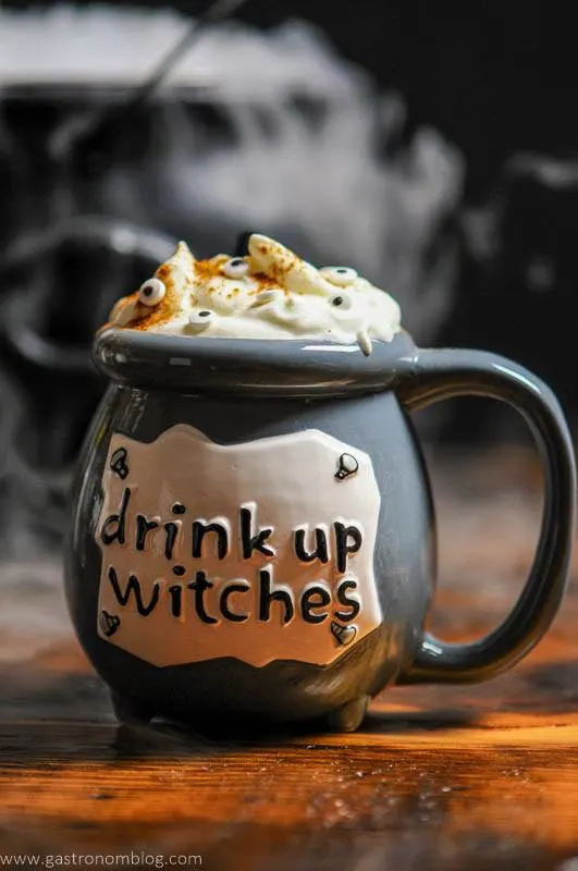 Gray Cauldron holding a Halloween Cocktail