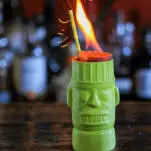 Green zombie mug with fire