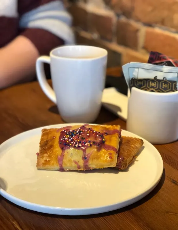 Poptarts on plate, coffee mug in background