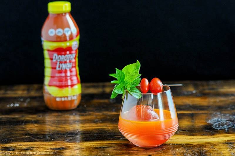 Orange cocktail, Dorothy Lynch bottle in background