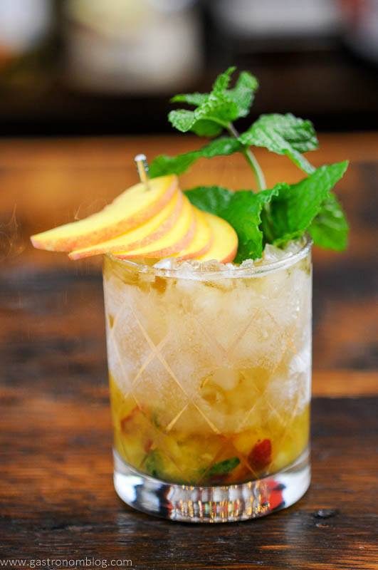 Peach Julep in gold etched glass, peach slices and mint