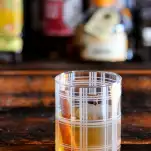 Whiskey Old Fashioned in plaid glass