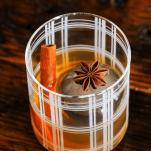 Whiskey cocktail in striped glass