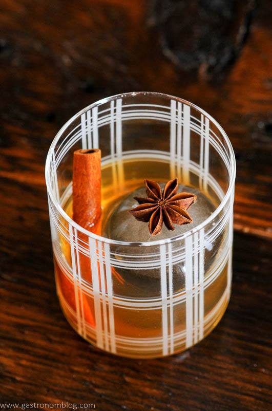 Striped rocks glass with Spiced Old Fashioned