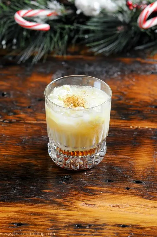 White Russian cocktail in rocks glass, brown layer on bottom, creamy layer on top