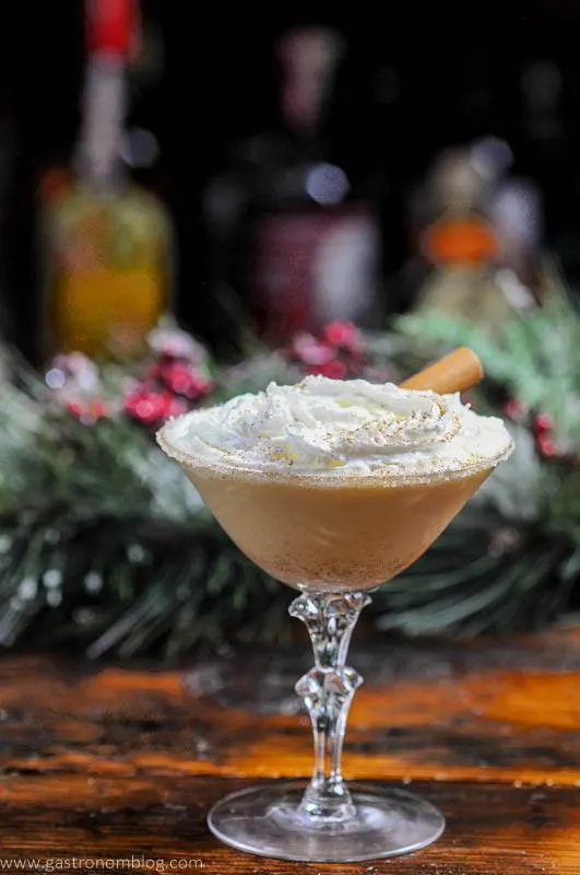 Gingerbread Eggnog Cocktail in coupe with whipped cream
