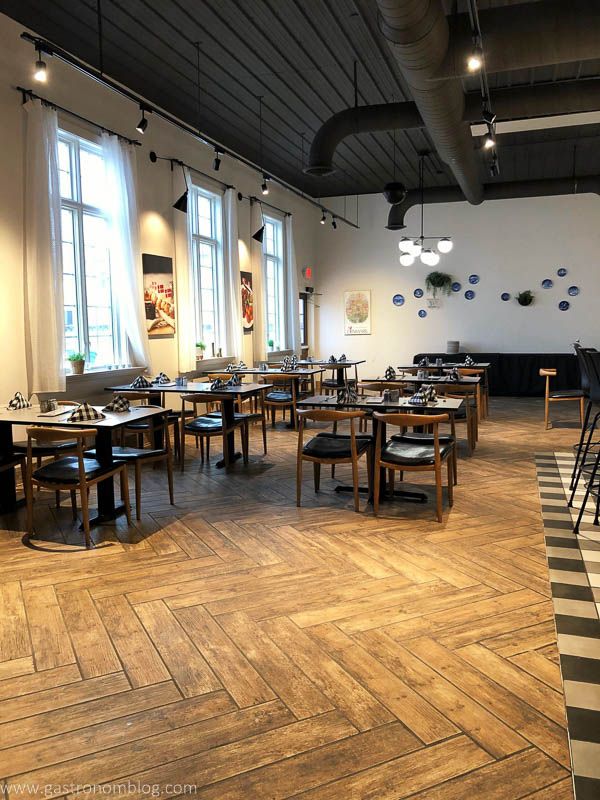Minimalist Scandinavian restaurant decor, wood, black and white