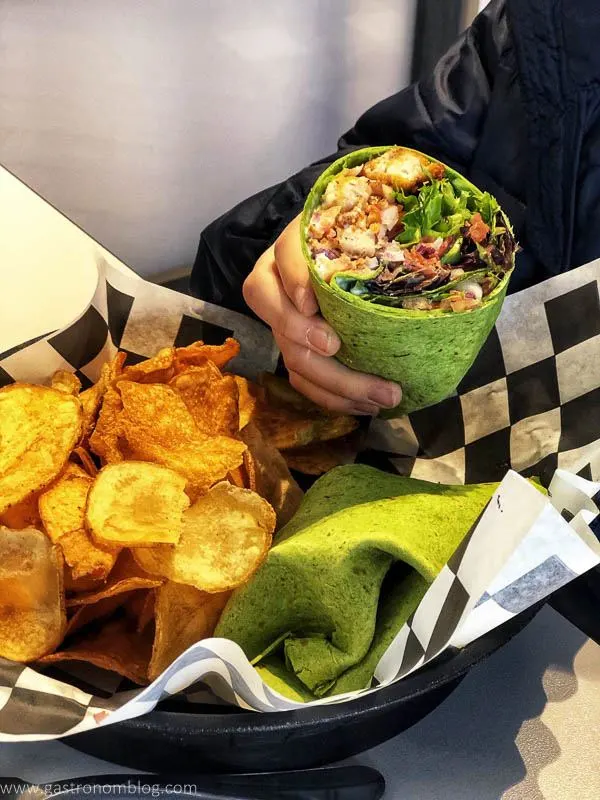 Wrap sandwich and chips in a basket