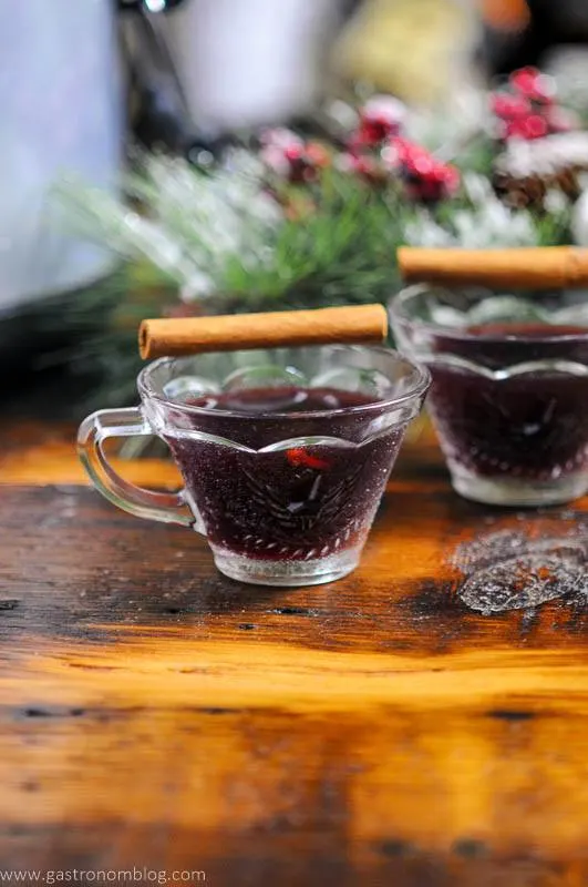 Purple Punch in cups with cinnamon sticks